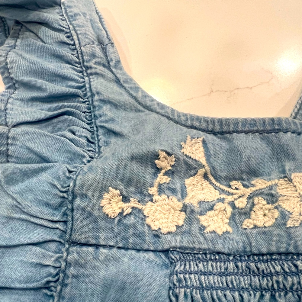 Gap 18 months girls denim colored onesie with embroidery.